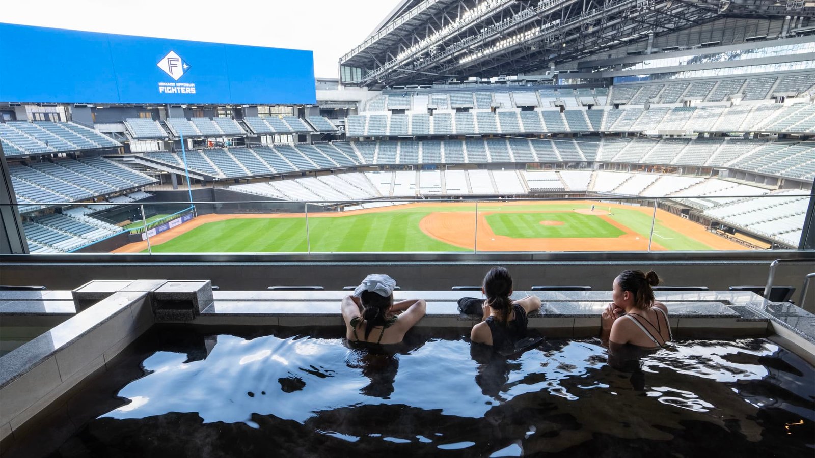 A baseball stadium with a hotel with rooms overlooking the field post thumbnail image